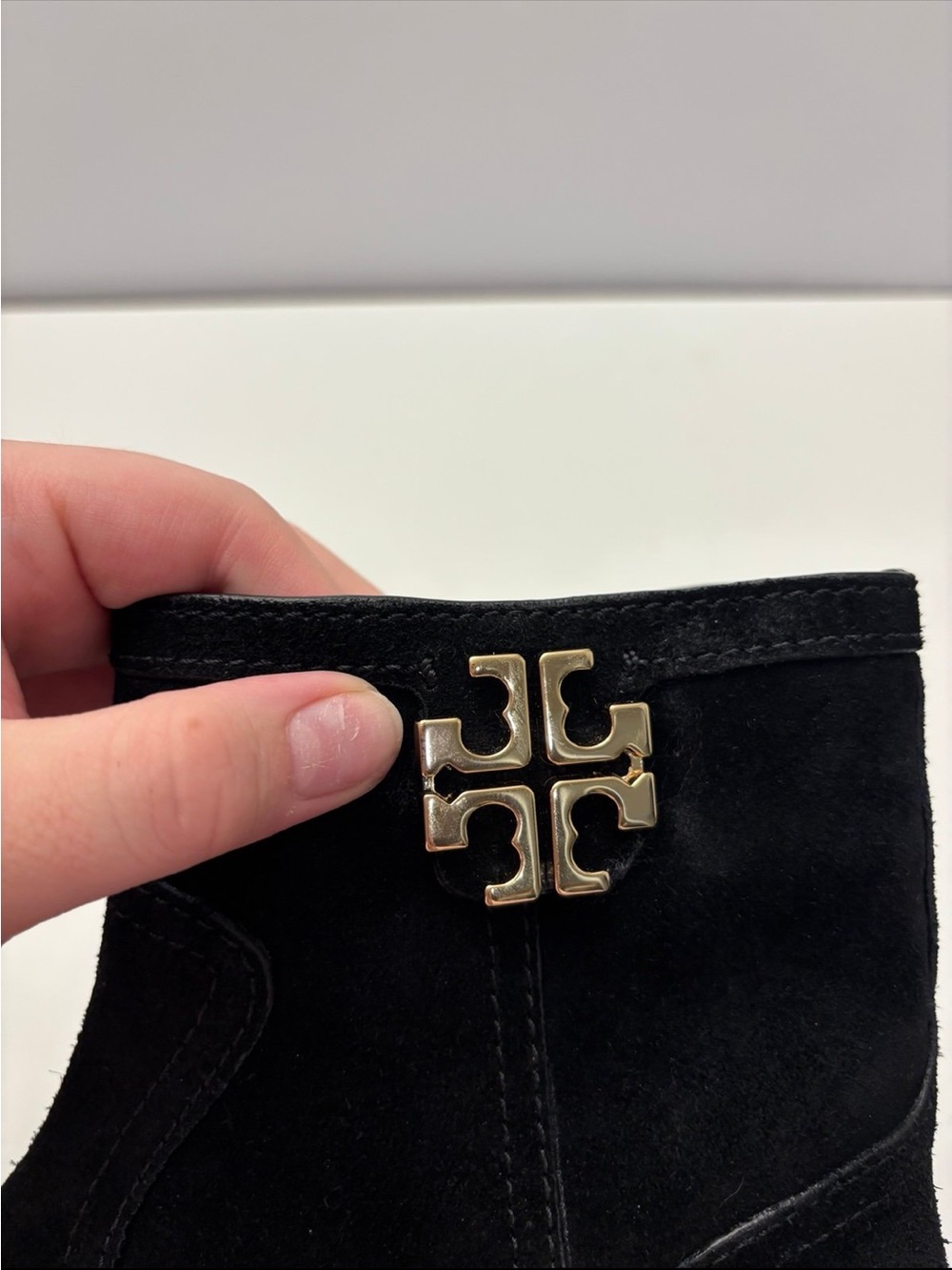 Tory Burch black suede Eloise flat booties with a prominent gold-tone metal logo - Picture 7 of 12